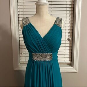 NWT. Turquoise Bridesmaid Gown size small